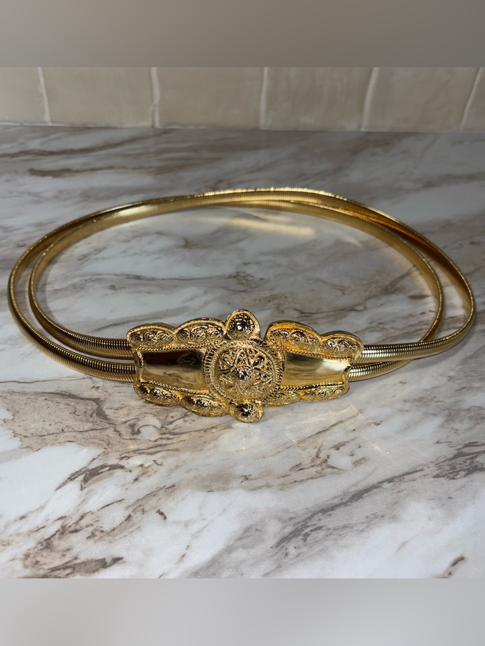 Vintage Accessocraft N.Y.C. Gold Tone Metal Etruscan Buckle Expandable Belt